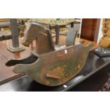 FOLK ART. A 19TH CENTURY PAINTED WOOD ROCKING HORSE. 2ft 3ins long.