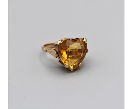 A heart shaped citrine cocktail ring in yellow metal, stamped 18k, size J, gross weight 8.0gm