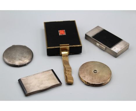 A Continental silver and black enamel Art Deco compact/cigarette case with engine turned decoration, 2 x 11 x 6cm, together w
