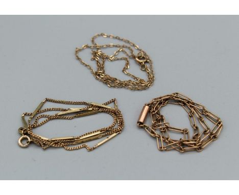 Three chains. A curb and bar 9ct chain (hallmarked), approximate weight 3.6gm, along with a 16 inch yellow metal necklet with