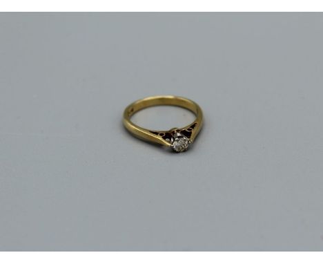 An 18ct gold diamond solitaire ring, hallmarked Birmingham, size J, 2.4gm