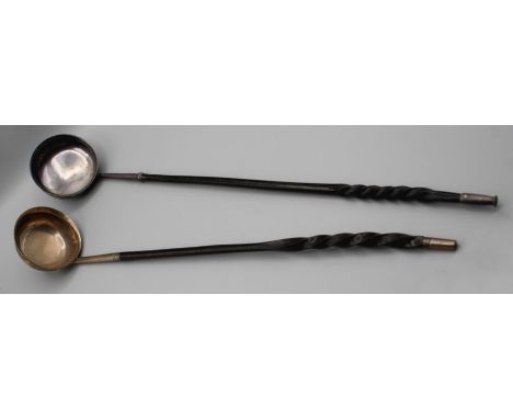 A late 18th century probably Scottish, silver punch ladle, unmarked bowl to wrythen whalebone handle, 40cm together with anot