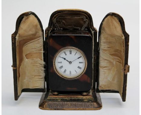 William Comyns and Sons Ltd, a George V silver mounted tortoiseshell cased travelling timepiece, the French movement faced by