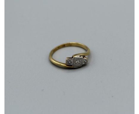 A diamond Art Deco ring featuring three illusion set diamonds in a square crossover panel, size K, gross weight approximately