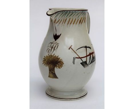 A 19th century Wedgwood cream ware harvest jug of baluster loop handled form, polychrome decorated with rake, plough, scythe 