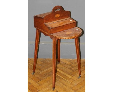 An Edwardian satinwood, boxwood shell and fan inlaid needlework table, the top with pierced carrying handle, two covered comp