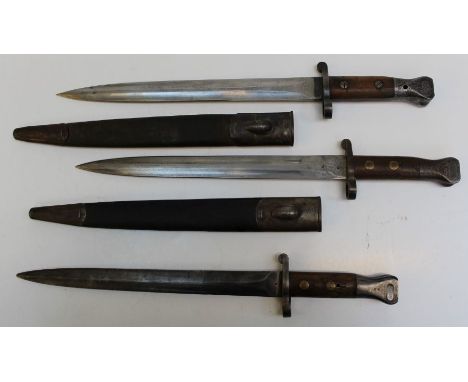 An early 20th century Lee Metford Highland Light Infantry bayonet together with two other Lee Metford bayonets, one stamped W