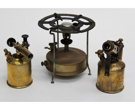 An early 20th century Swedish ' Svea' paraffin stove , together with a Vapouria No. 12 blowlamp and one other lamp