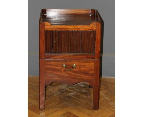 A George III mahogany tray top night commode, with tambour cupboard and chequer strung pull out lower section fitted tooled h