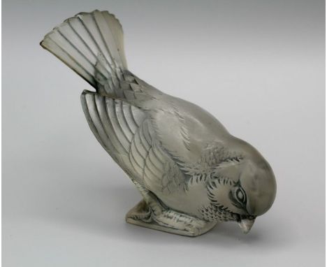 A Lalique moulded glass model of a sparrow with tail feathers raised, 11 x 10cm, numbered K 1150. Incised italic mark R Laliq