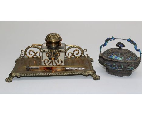 An Edwardian brass inkstand fitted single well, together with an onyx and silver mounted dip pen and a filigree and enamel ba