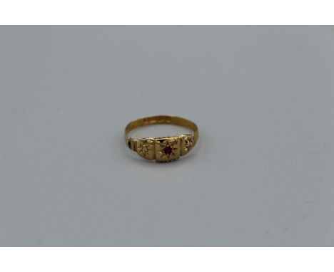 An 18ct Gypsy set ruby and rose cut diamond ring, hallmarked for Chester, size Q, 1.7gm