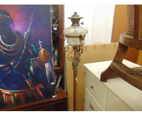 A copper and brass telescopic standing oil lamp
