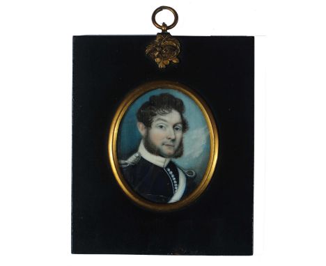 AN EARLY 19TH CENTURY OVAL MINIATURE PORTRAIT of a Naval officer, watercolour on ivory, 6.5cm high