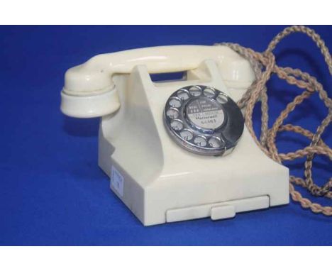 VINTAGE TELEPHONE
cream coloured, numbered 332CB PX56/2A to the base