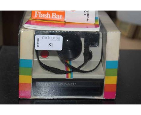 BOXED VINTAGE POLAROID LAND CAMERA 1000
with paperwork, magicubes and flash bar