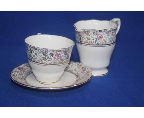 ROYAL STAFFORD GILT AND ENAMEL TEA SET
bordered in gilt floral transfer print with pink and blue enamel details, with twelve 