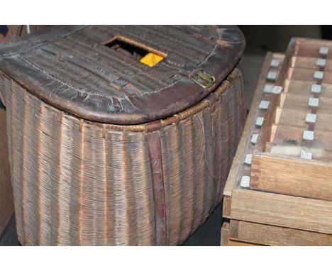VINTAGE WICKER FISHERMANS TACKLES BASKET
with fly tieing equipment inside, including several vintage reels; together with fiv
