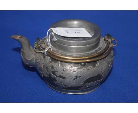 CHINESE METAL TEAPOT
decorated with engraved dragons