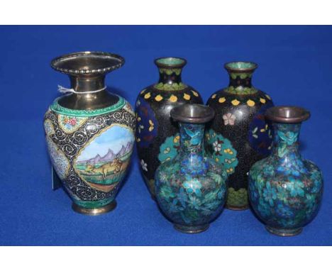 FOUR SMALL CHINESE CLIOSONNE VASES
a pair of black vases and a pair of blue floral vase; together with a Persian enamel vase 