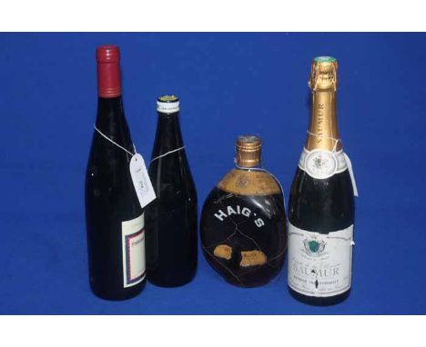 FOUR BOTTLES OF ALCOHOL
Haig's Dimple Whisky, Mackeson Dark Ale, Saumur Sparkling Wine and Ferdinand Pieroth Hungarian Wine. 