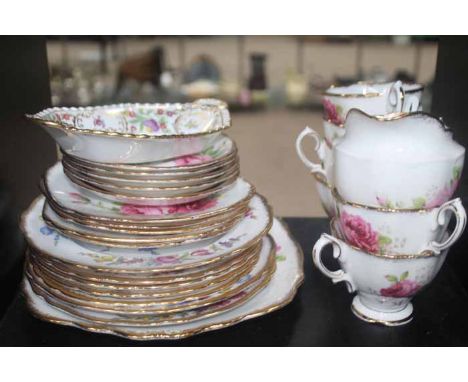 CROWN STAFFORDSHIRE PART TEA SERVICE 
along with a Royal Albert 'American Beauty' part tea service