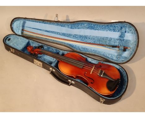 A Rosetti Stradivarius model violin, with a two piece back and ebonised fittings, 60cm, a bow with nickel end fitted in a mod