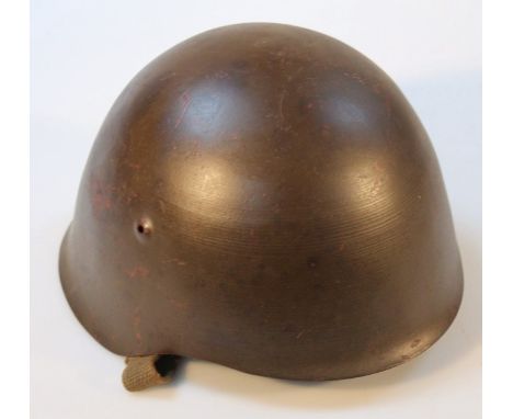 A mid 20thC steel infantry helmet.