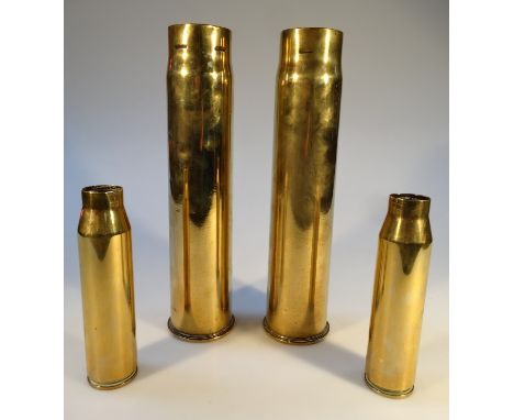 Two WWII 6pdr brass ordnance shell cases, and two 30mm shell cases. (4)