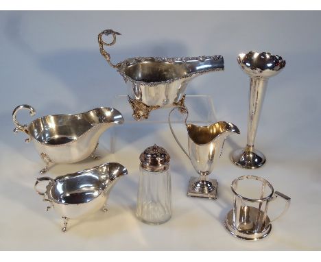 Various silver plate, comprising a cream jug of helmet shape form, with a 'C' scroll handle on shaped foot terminating in pla