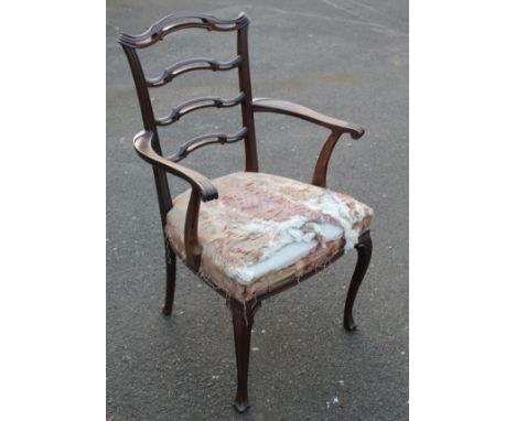 A 19thC mahogany Chippendale design ladderback chair, with a scroll top rail, above pierced comb back ladder splats, and shap