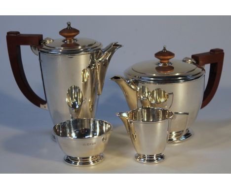 A George V bachelor's tea service, by Adie Brothers Ltd, comprising coffee pot, 16cm high, teapot, sugar bowl and cream jug, 