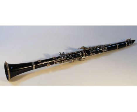 A mid-20thC Evette five piece clarinet, in fitted case, 68cm high.