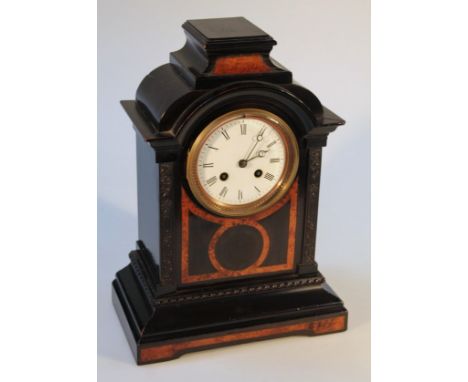 A 19thC ebonised and burrwood mantel clock, the classical domed case, with circular Roman numeric dial, revealing an 8-day ha