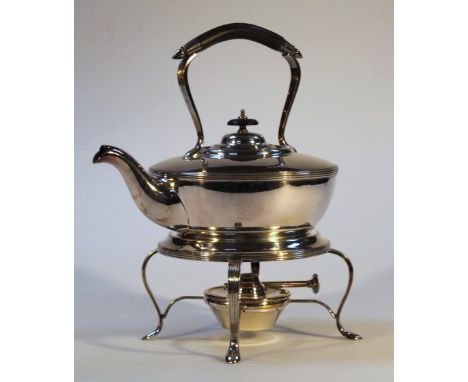 An early 20thC silver plated spirit kettle, with ebonised handle, shaped spout and bulbous body raised on a circular stand, t