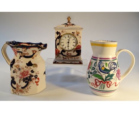 A Mason's Ironstone Mandalay pattern clock, 22cm high,12cm wide, 8cm deep, a similar jug and a Poole jug of bulbous form, dec