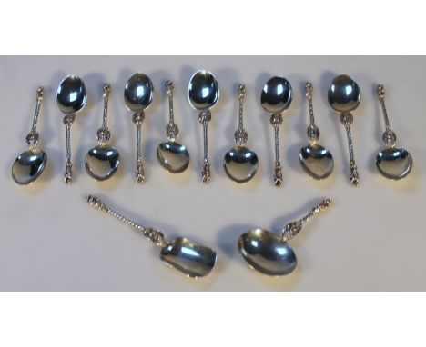 A Victorian silver thirteen piece apostle cutlery set, by Martin, Hall & Co, comprising eleven spoons, sugar server and caddy