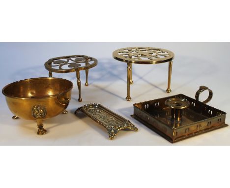 Various brassware, to include an early 20thC pen stand, of rectangular form heavily embossed with flowers and scrolls, on qua