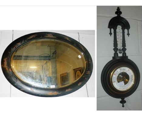Early 20th century Oriental style bevelled glass mirror and an aneroid barometer CONDITION REPORT: 
