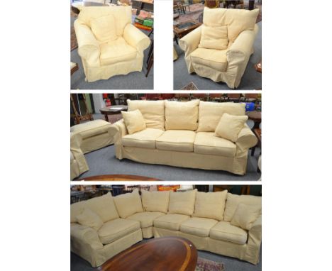 A Collins & Hayes four piece suite comprising a three seater sofa, a five seater L-shaped sofa, two armchairs and the matchin