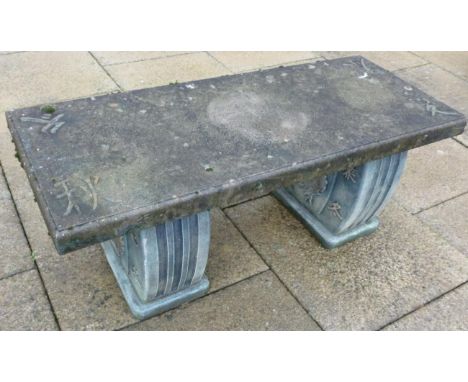 A Stone bench in the Oriental style, 110cm wide CONDITION REPORT: 