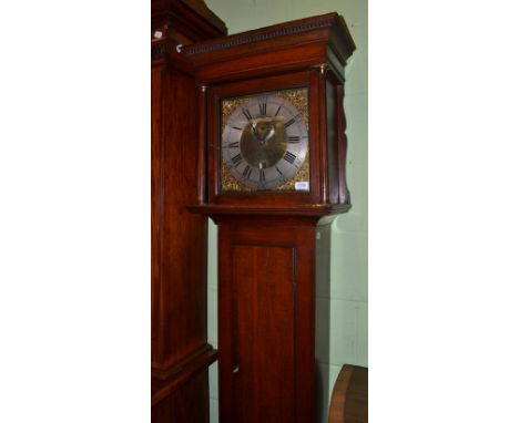 An oak thirty hour longcase clock, signed John Rowning, Newmarket, circa 1770, flat top pediment, 12-inch brass dial with a s