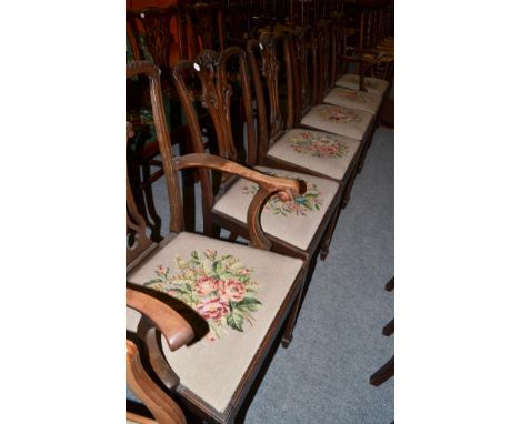 A set of six early 20th century Chippendale style dining chairs and a Hepplewhite style armchair with drop-in seat (7) CONDIT