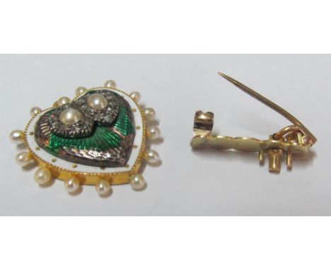 A heart shaped seed pearl and enamel pendant brooch with two central seed pearl and diamond hearts (some enamel rubbed)