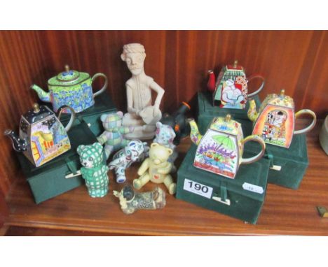 Five miniature enamel teapots and other ornaments