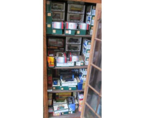 Four shelves of Corgi, Days Gone By and other boxed vehicles