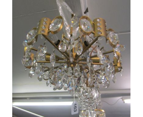 A 1970's style gilt ceiling light with lustre drops
