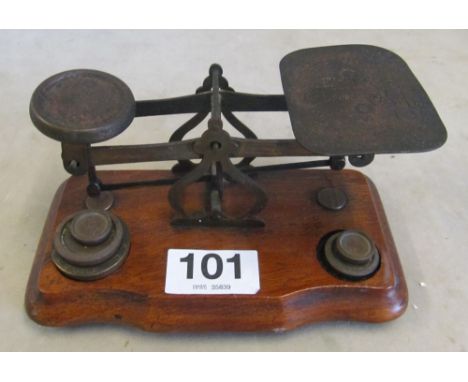 A set of postal scales and some weights