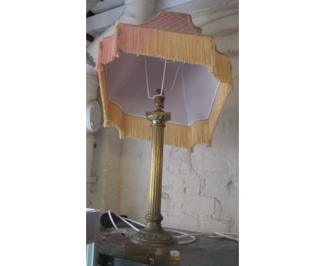 A brass table lamp