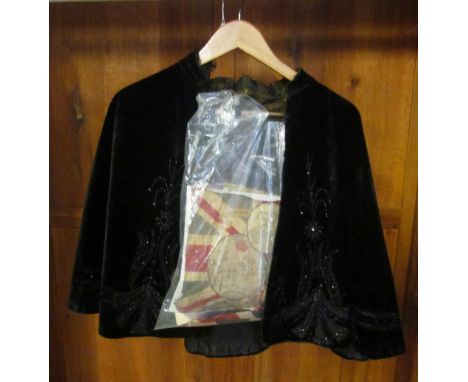 A Chipperfields &amp; Butlers velvet and sequin cape and Coronation textiles